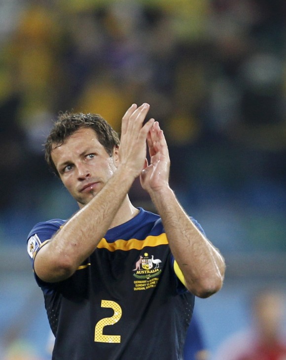 Australia's Lucas Neill acknowledges the crowd after the 2010 World Cup Group D soccer match against Germany at Moses Mabhida stadium in Durban