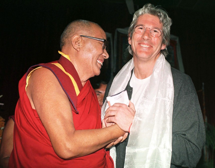 HOLLYWOOD ACTOR RICHARD GERE SHARES A LAUGH WITH GANDEN TRI RINPOCHE, HEAD OF TIBETAN SCHOOL OF BUDDISM DURING A CONFERENCE IN NEW DELHI