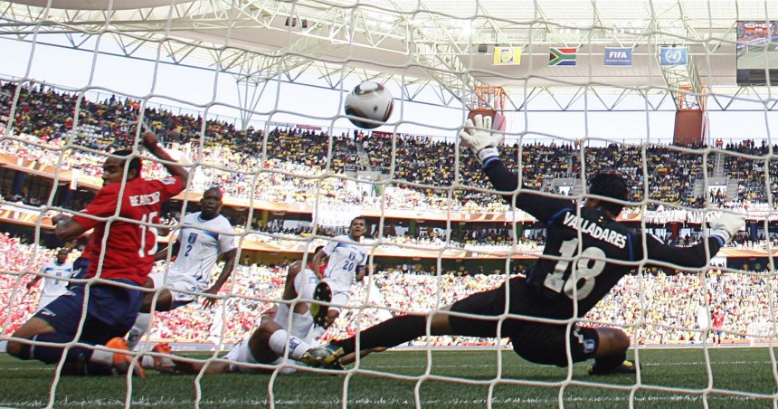 Chile's Beausejour scores against Honduras during the 2010 World Cup Group H match at Mbombela stadium in Nelspruit