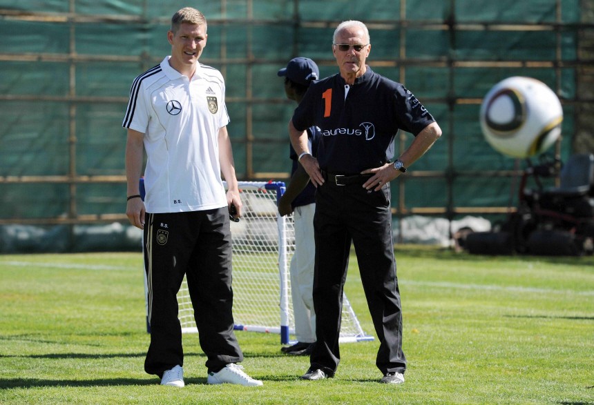 Germany's soccer player Schweinsteiger and Franz Beckenbauer take part in 'Laureus Sports for All' project with South African youths in Erasmia