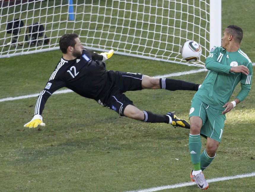 Greece's goalkeeper Alexandros Tzorvas concedes a goal during the 2010 World Cup Group B soccer match against Nigeria at Free State stadium in Bloemfontein