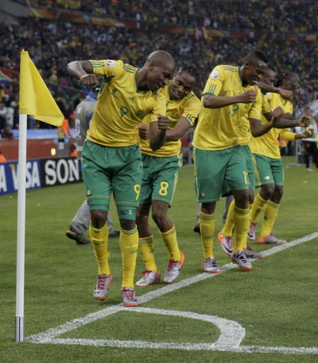 South Africa's Siphiwe Tshabalala dances with team mates after he scored the first goal against Mexico during their 2010 World Cup opening match at Soccer City stadium in Johannesburg