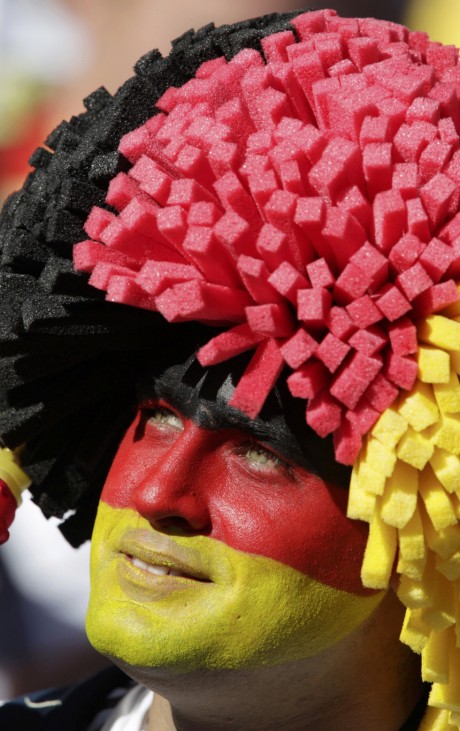 A fan in face paint smiles ahead of the 2010 World Cup Group D soccer match between Germany and Serbia in Port Elizabeth