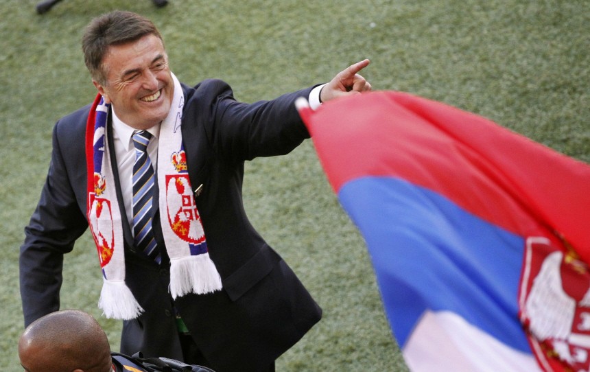 Serbia's head coach Antic celebrates after defeating Germany in 2010 World Cup Group D soccer match in Port Elizabeth