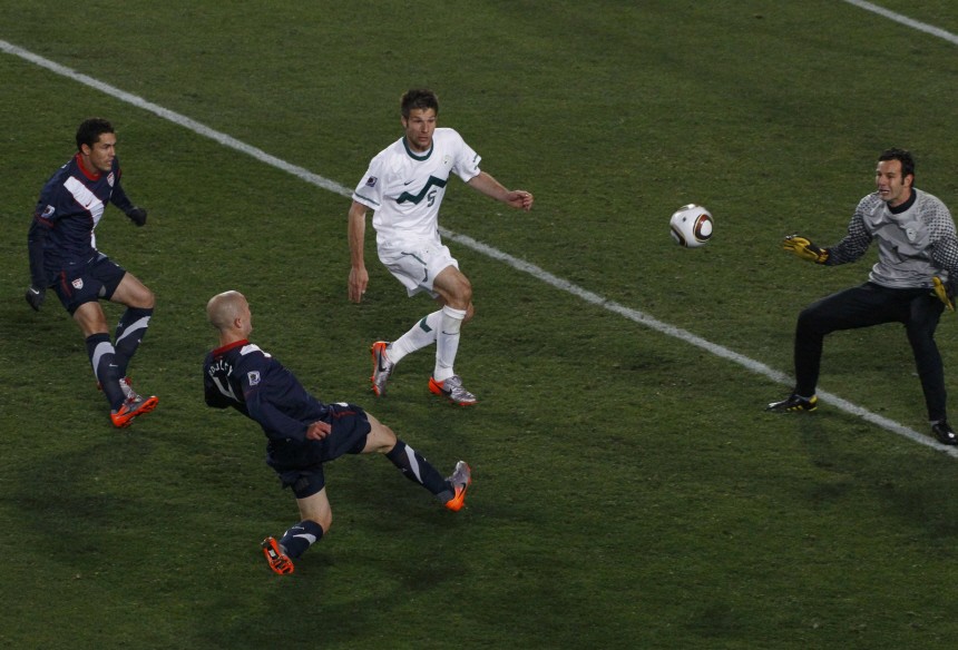 Michael Bradley (2nd L) of the U.S. shoots to score the second goal past Slovenia's goalkeeper Samir Handanovic during their 2010 World Cup Group C soccer match at Ellis Park stadium in Johannesburg