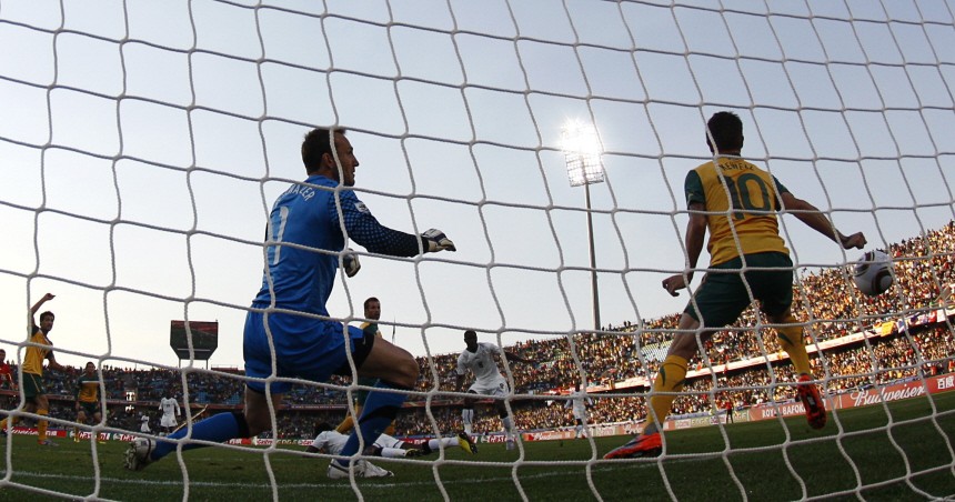 Australia's Harry Kewell blocks a shot on goal by Ghana during a 2010 World Cup Group D soccer match at Royal Bafokeng stadium in Rustenburg