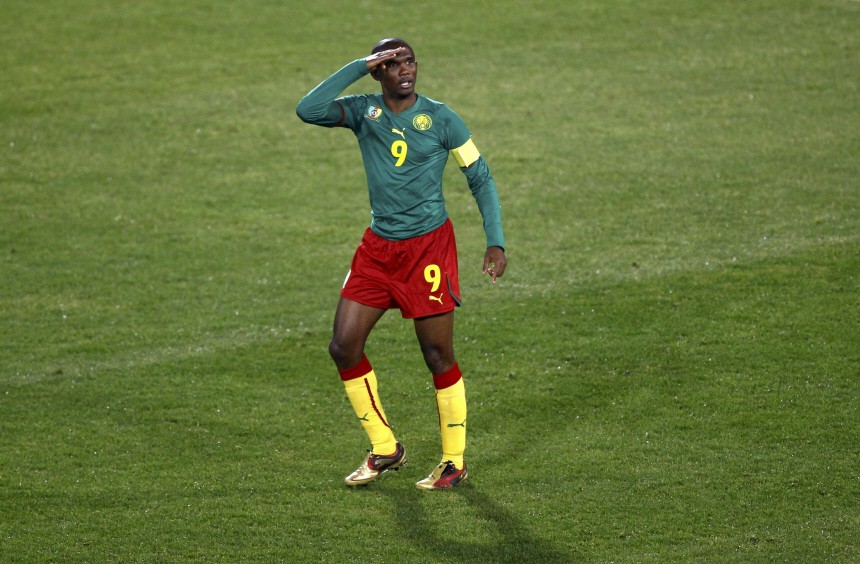 Cameroon's Eto'o salutes after scoring a goal during a 2010 World Cup Group E soccer match against Denmark in Pretoria