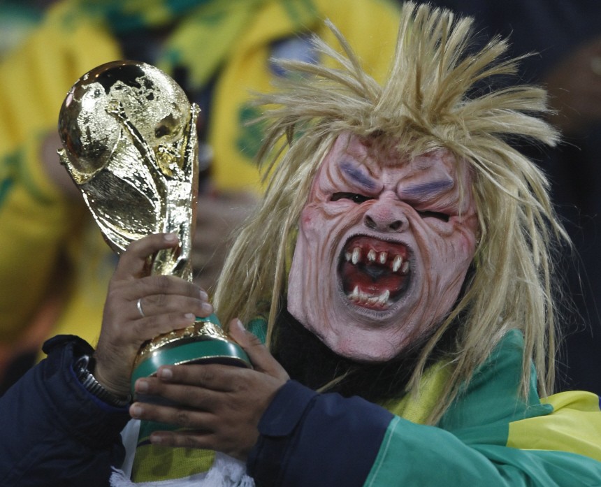 Brazilian fan awaits the 2010 World Cup Group G soccer match against Ivory Coast at Soccer City stadium in Johannesburg