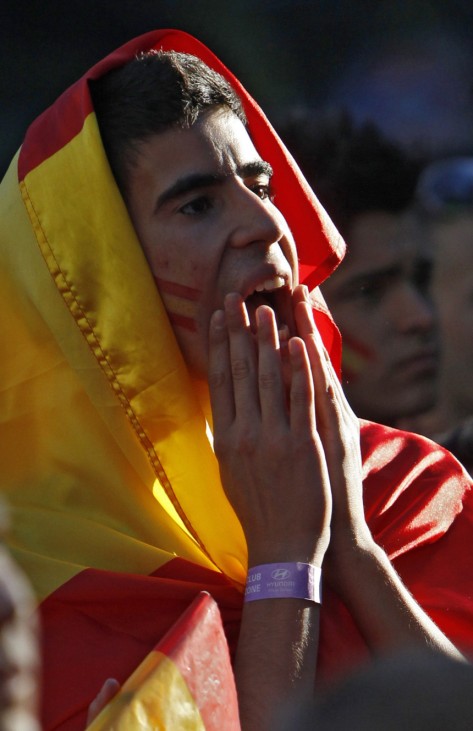 Spanish fan reacts while watching the 2010 World Cup match between Spain and Honduras, in Madrid