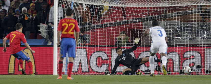Spain's Villa misses his penalty shot during a 2010 World Cup Group H match against Honduras at Ellis Park stadium in Johannesburg