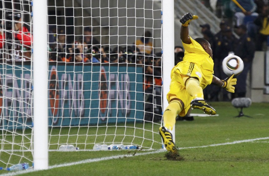 Nigeria's goalkeeper Enyeama concedes a goal by South Korea's Park during  World Cup soccer  match in Durban