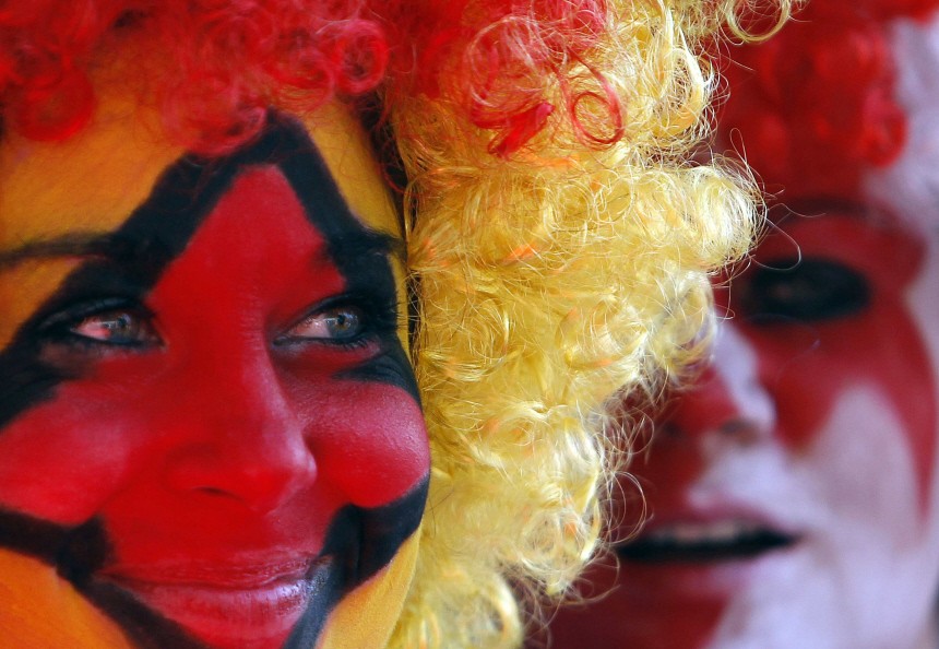 A German fan smiles outside Free State stadium before the start of the 2010 World Cup second round soccer match between England and Germany in Bloemfontein
