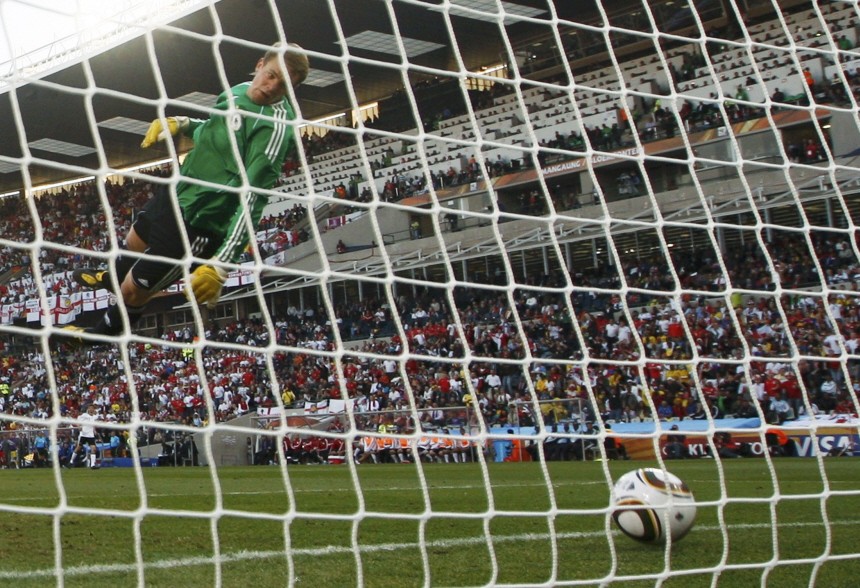 Germany's goalkeeper Manuel Neuer watches as the ball crosses the line during the 2010 World Cup second round soccer match against England at Free State stadium in Bloemfontein