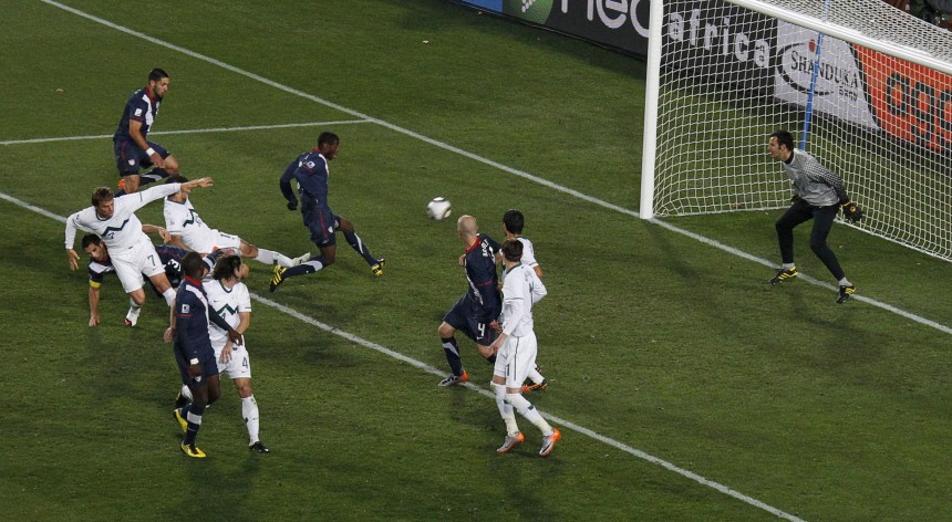 Edu of the US shoots at goal, which was later disallowed, during the 2010 World Cup Group C soccer match against Slovenia in Johannesburg