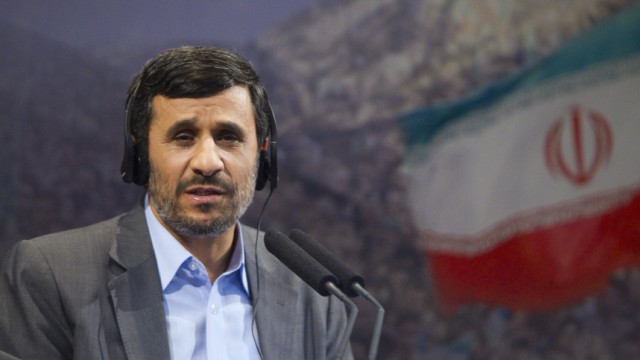 Iranian President Ahmadinejad speaks during news conference in Tehran