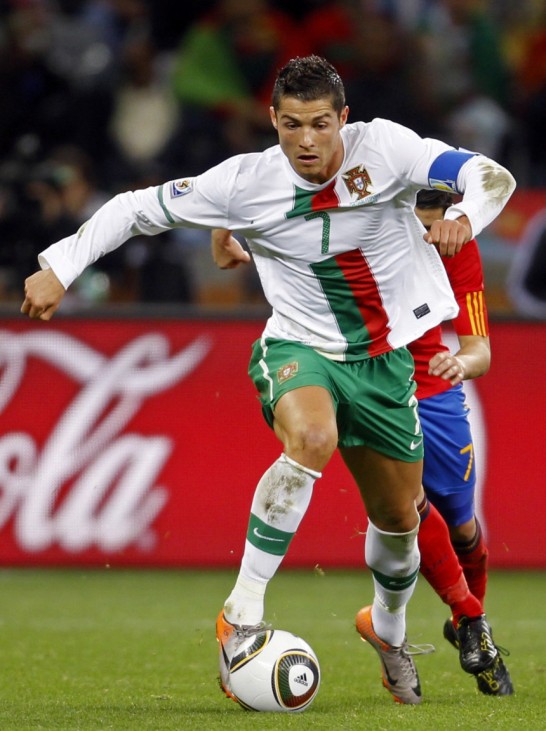 Portugal's Ronaldo controls the ball ahead of Spain's Villa during the 2010 World Cup second round soccer match at Green Point stadium in Cape Town