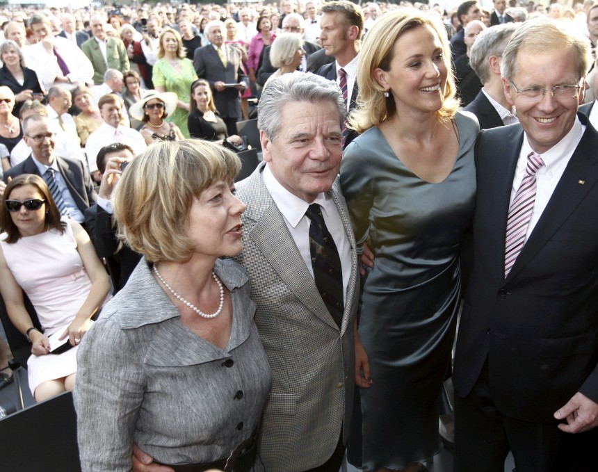 Newly sworn-in German President  Wulff,  his wife Bettina,  Joachim Gauck and his partner Daniela Schadt attend the summer reception at the presidential residence Bellevue palac in Berlin