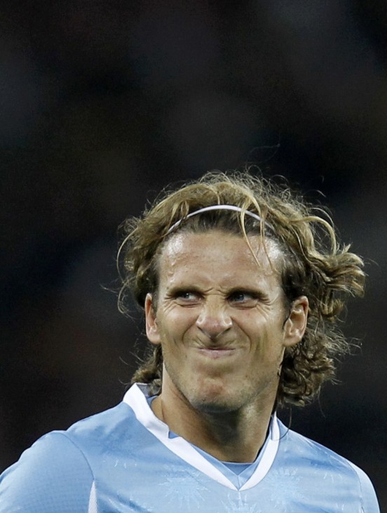 Uruguay's Diego Forlan reacts during the 2010 World Cup quarter-final soccer match against Ghana at Soccer City stadium in Johannesburg