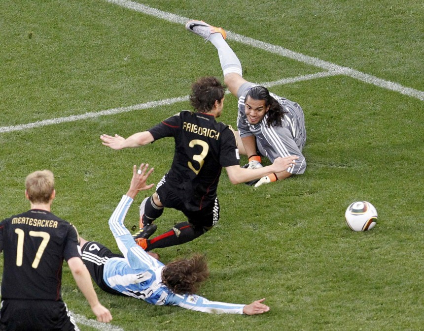 Germany's Friedrich scores a goal past Argentina's goalkeeper Romero during a 2010 World Cup quarter-final soccer match in Cape Town