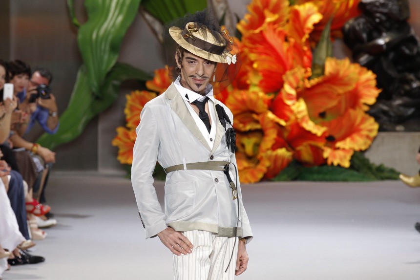 British designer John Galliano appears at the end of his Fall/Winter 2010-2011 Haute Couture fashion show for French fashion house Dior in Paris