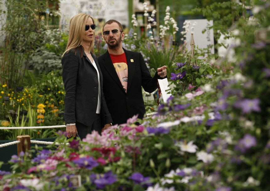 British musician Ringo Starr and his wife Barbara Bach look at displays at the Chelsea Flower Show in London