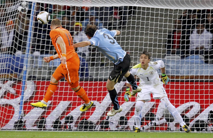 Netherlands' Arjen Robben scores a goal during their 2010 World Cup semi-final soccer match at Green Point stadium