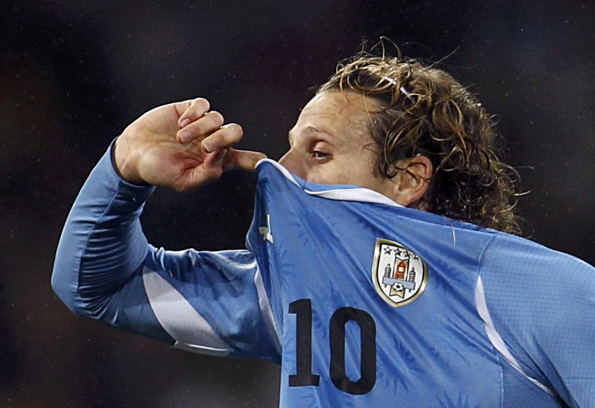 Uruguay's Diego Forlan reacts after the final whistle in Port Elizabeth