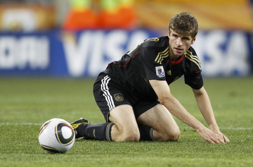 Germany's Mueller eyes the ball during the 2010 World Cup third place playoff soccer match against Uruguay in Port Elizabeth