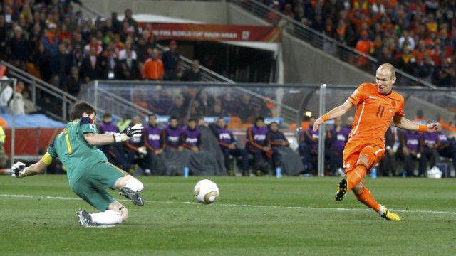 Netherlands' Arjen Robben misses a scoring chance during their 2010 World Cup final soccer match at Soccer City stadium
