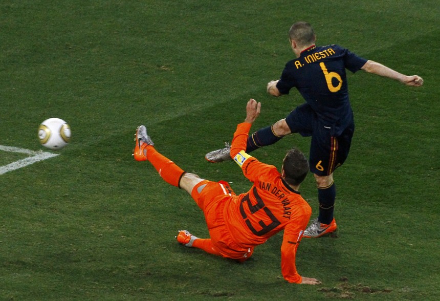 Spain's Andres Iniesta shoots to score against Netherlands during their 2010 World Cup final soccer match at Soccer City stadium in Johannesburg