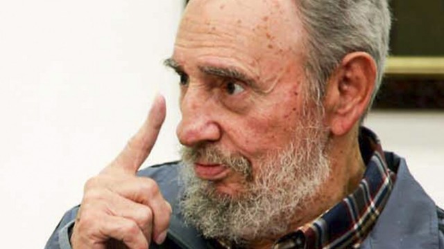 Former Cuban leader Fidel Castro gestures during an interview with anchor Randy Alonso in Havana