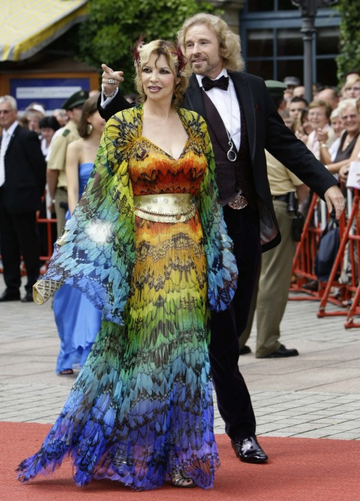 German entertainer Gottschalk and his wife Thea pose on the red carpet after their arrival for the opening of this year's Bayreuth Wagner opera festival in Bayreuth