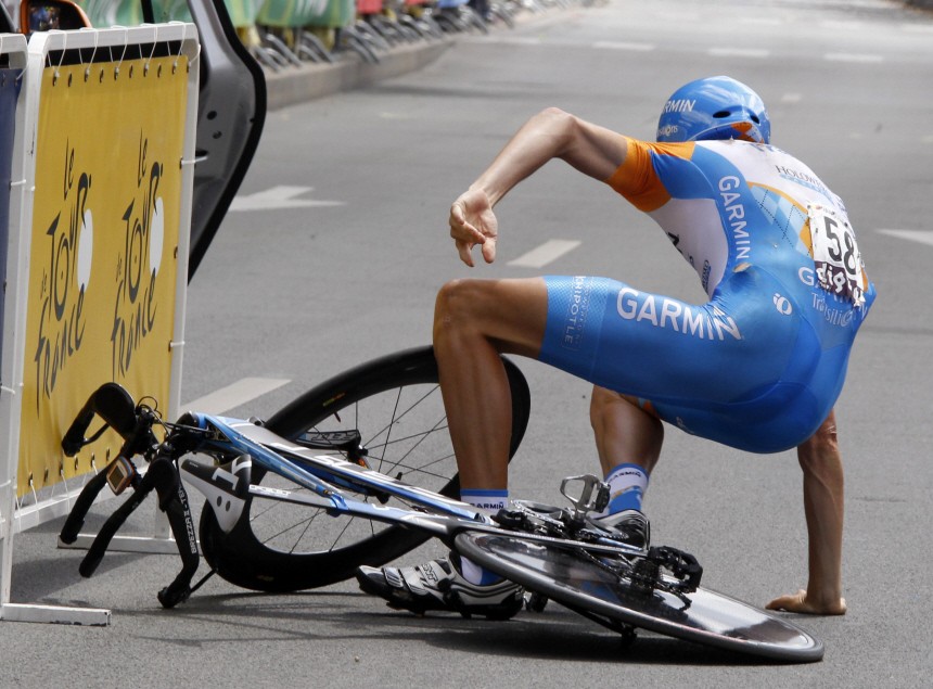 Garmin team rider Johan Van Summeren of Belgium falls at the start of the individual time-trial 19th stage of the Tour de France cycling race between Bordeaux and Pauillac