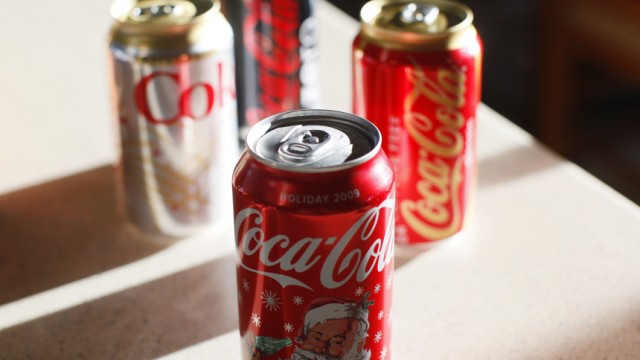 Coca-Cola products are displayed on a kitchen counter in Golden