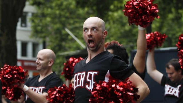 Male cheerleaders perform during the Gay Games VIII in Cologne