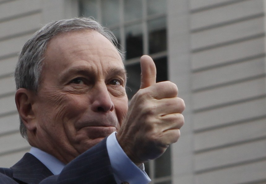 Mayor Bloomberg gestures to the crowd after taking the Oath of Office during his inauguration at New York's City Hall