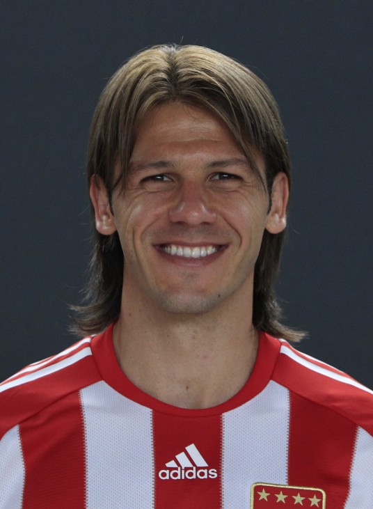 Bayern Munich's Demichelis poses during official team photo session in Munich