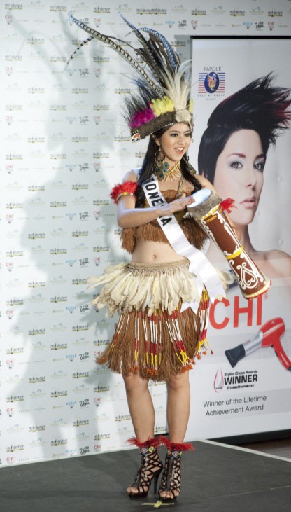 Miss Indonesia Qory Sandioriva poses in her national costume at the Mandalay Bay Resort and Casino in Las Vegas