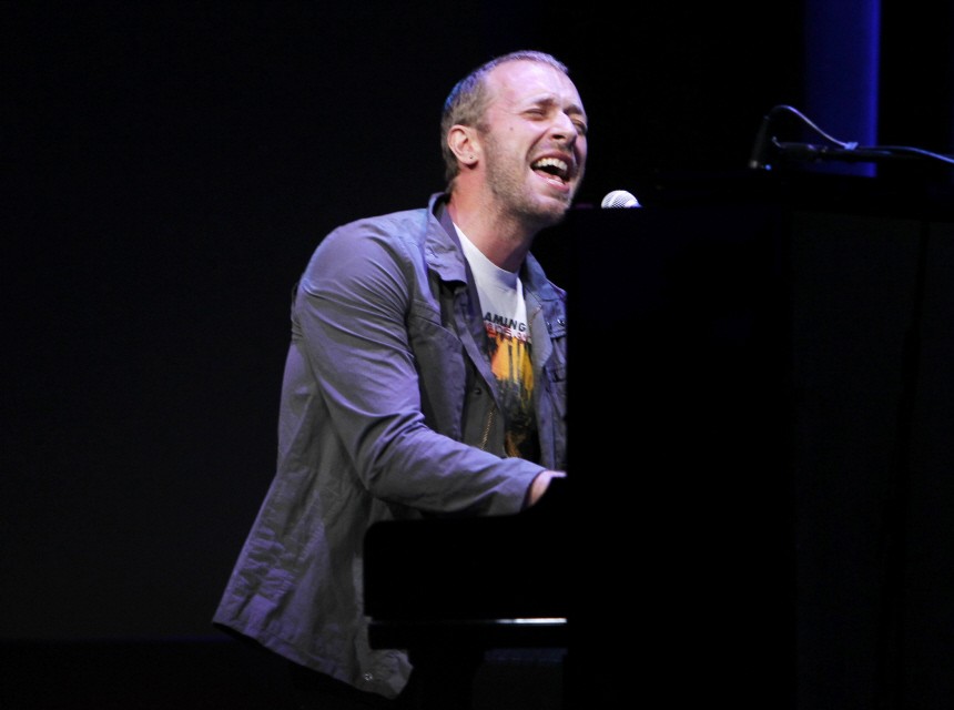 Chris Martin of Coldplay performs at Apple's music-themed September media event in San Francisco