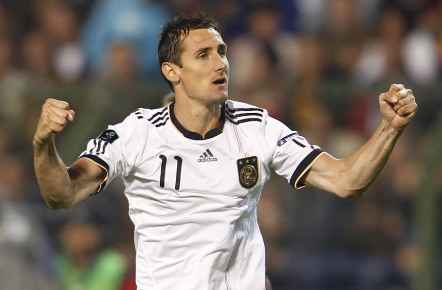 Germany's Klose celebrates a goal against Belgium during their Euro 2012 qualifying soccer match in Brussels