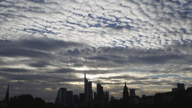 The skyline of Frankfurt is pictured under clouds