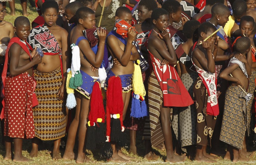 Maidens wait before taking part in the annual Reed Dance at Ludzidzini in Swaziland