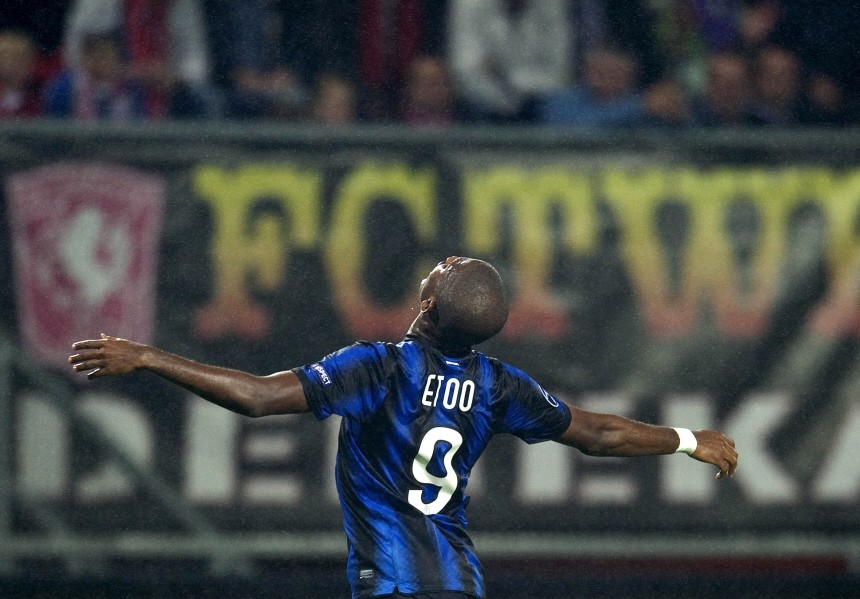 Samuel Eto'o of Inter Milan celebrates his goal against Twente Enschede during their Champions League Group A soccer match in Enschede